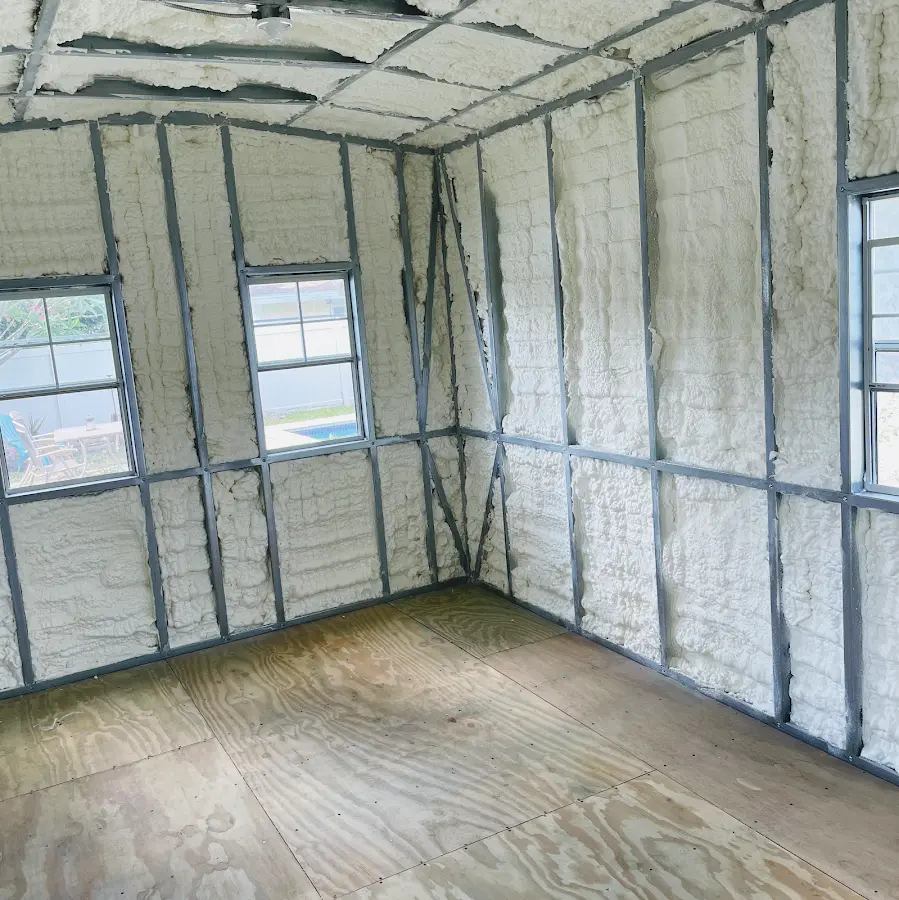 Closed-cell spray foam insulation applied to wall cavities in a residential project in Mayflower Village